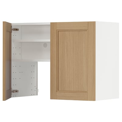 METOD kitchen cabinet in oak. Two-tone design with adjustable shelves, shown open and closed.