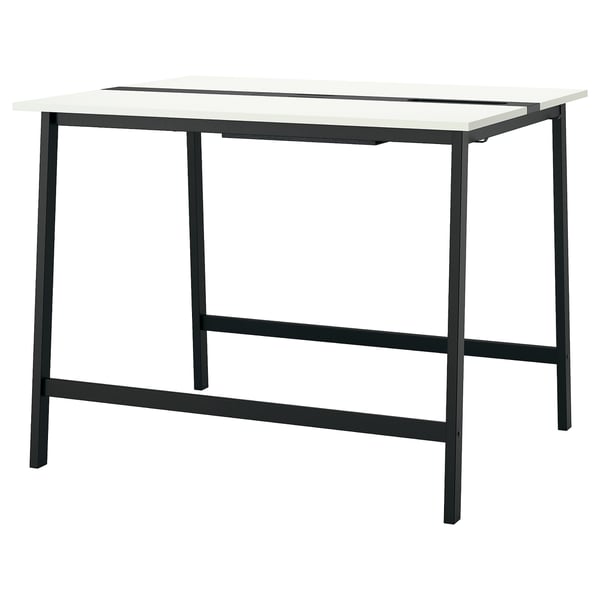 The MITTZON table a white top and black metal legs, designed for minimalist style.