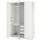 A white PAX wardrobe with mirrored doors and adjustable shelves.