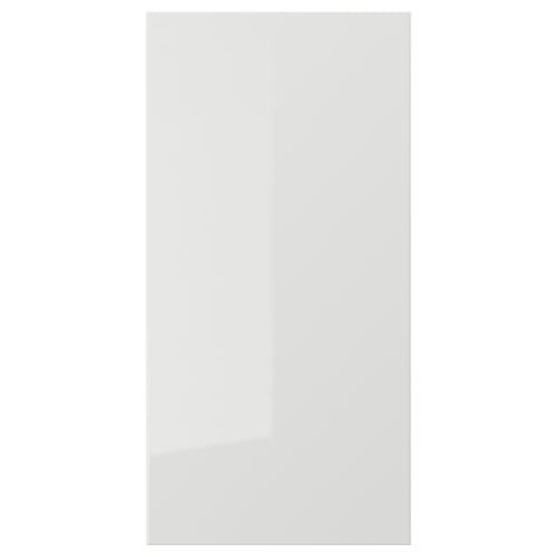 A sleek, white RINGHULT kitchen cabinet door with a glossy finish. Its rectangular, modern, and designed for easy cleaning.