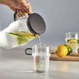 SKINNFISK Jug with lid, clear glass, 1.2 l