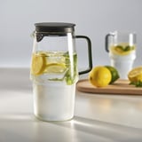 SKINNFISK Jug with lid, clear glass, 1.2 l