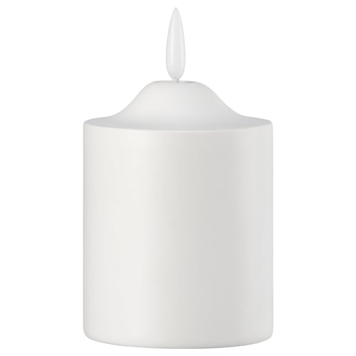 A white cylindrical SMÅLOM led candle with a rounded top and a small finial. Made of polypropylene plastic, its designed to mimic real candles safely.