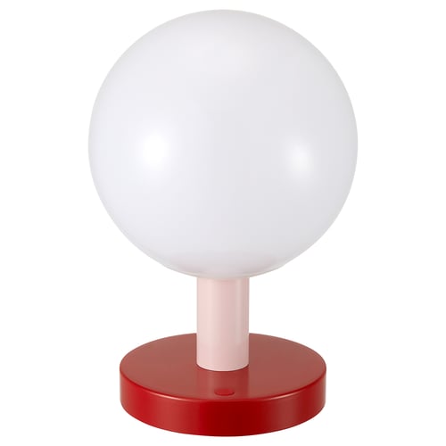 A SOLVINDEN lamp. Its round and white with a red base. Made of plastic and metal with a modern design.