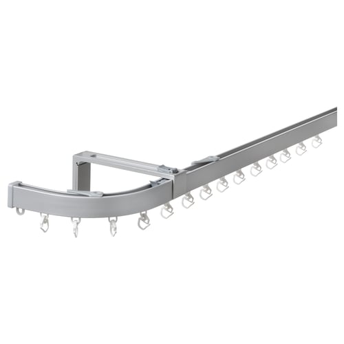 Silver VIDGA curtain rail system with adjustable corner pieces and hooks for flexible curtain placement.