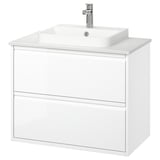 Tocador de bany blanc de paret, disseny modern i elegant amb dos calaixos, tiradors integrats i un lavabo de marbre semi-encastat.