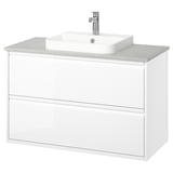 Lavabo blanc modern amb disseny elegant, lavabo semi-encastat, nanses mínimes, muntatge a la paret.