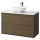 Modern moble de bany de paret de fusta fosca amb taulell blanc i lavabo rodó. Disseny minimalista.