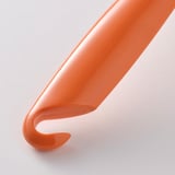 Mànec de raspall de plat de color taronja brillant, elegant i modern, amb forat per penjar.