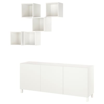 Mostra una combinació d'emmagatzematge BESTÅ blanc amb prestatges i armari per a l'organització de la llar.