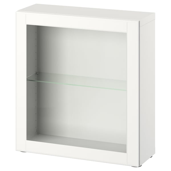 Armari de paret blanc Ikea BESTÅ. Disseny quadrat i minimalista amb porta i prestatgeria de vidre.