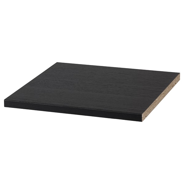 Una prestatgeria BILLY rectangular negra feta de taulers de partícules i vores de plàstic.
