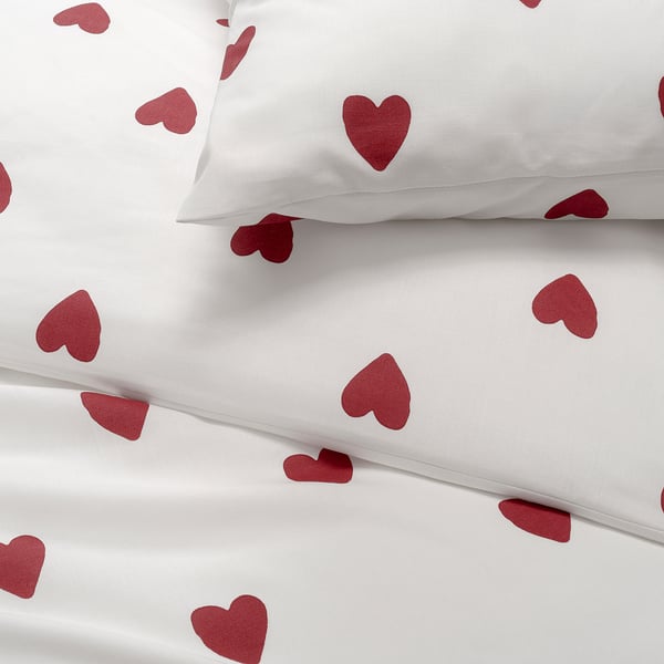 Conjunt de llençols de cors vermells amb funda de coixí, llisa barreja de cotó i raió.