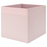 Caixa d'emmagatzematge de tela rosa, de forma quadrada, dissenyada per a prestatgeries, elegant i funcional.