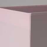 Primer pla de la caixa d'emmagatzematge de tela rosa que mostra costures resistents i ben cosides i teixit de qualitat.