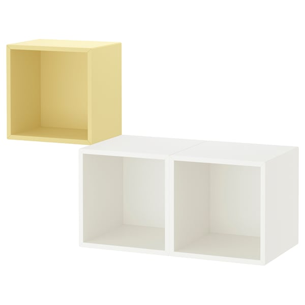 Dos prestatges d'emmagatzematge de cubs. Un groc, un blanc. Disseny minimalista i quadrat. Unitat de paret muntable.