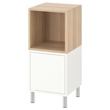 Moble d'emmagatzematge EKET, blanc amb tapa de fusta, combinant emmagatzematge obert i tancat. Quatre potes metàl·liques per a un aspecte modern.