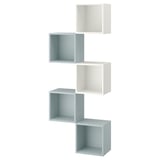 Emmagatzematge cub de paret Ikea EKET en quadrats blaus i blancs, disseny modern.