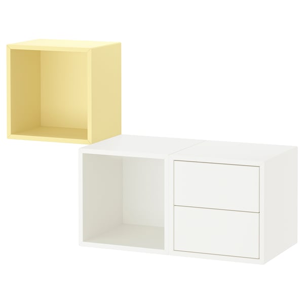 Dos cubs d'emmagatzematge moderns, un groc i un blanc; cubs minimalistes i quadrats amb obertura i un amb calaixos.