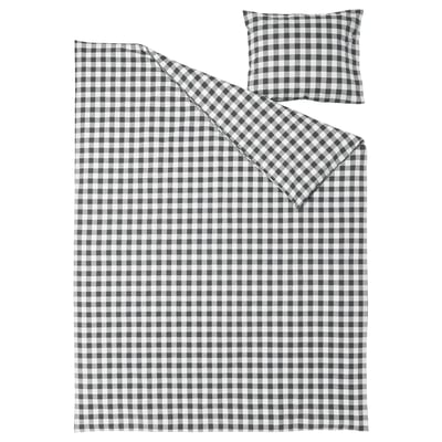 Aquesta imatge mostra un conjunt de llit EKTANDVINGE en quadres vichy gris i blanc. El conjunt inclou una funda nòrdica i una funda de coixí de cotó orgànic.