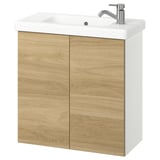Tocador de bany modern, sèrie ENHET. Acabat de fusta i taulell blanc amb lavabo individual. De paret amb portes efecte roure.