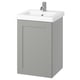 Un moble de bany de paret gris amb un lavabo blanc a la part superior. Té una sola porta plana i és elegant i moderna.