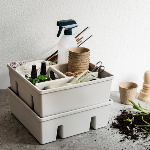 Organitzador FÅNGGRÖDA beix per a eines de jardineria, plàstic durador.