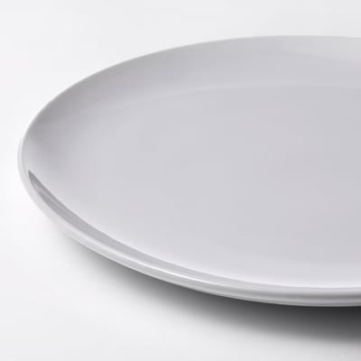 Conjunt de plats i bols de gres blanc, disseny senzill i elegant per a l'ús diari.