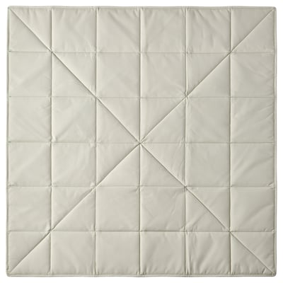 El GREJSIMOJS: manta ponderada de forma quadrada de color gris clar amb estampats quadrats.