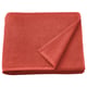 Tovallola GULVIAL plegada de color taronja brillant fabricada en 100% cotó, amb un disseny suau i texturitzat.