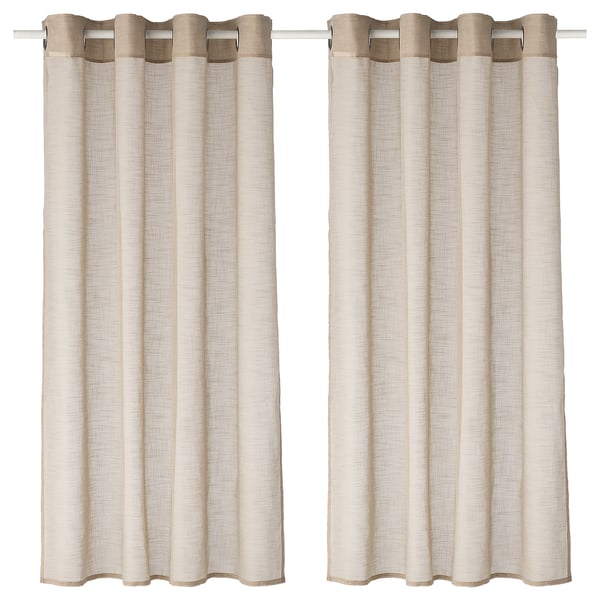 Dues cortines transparents de color beix clar pengen una al costat de l'altra, amb un disseny senzill d'ulls per a un aspecte modern.
