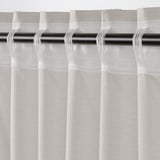 Cortines transparents blanques amb butxaca de vareta, que proporcionen privacitat alhora que permeten el pas de la llum.