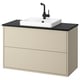 Tocador de bany beix modern amb taulell negre elegant i lavabo. Muntat a la paret amb dos calaixos per a l'emmagatzematge. Disseny elegant i funcional.
