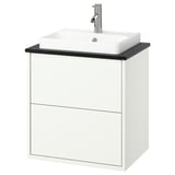 Moble de bany de paret blanc amb taulell i lavabo negres.