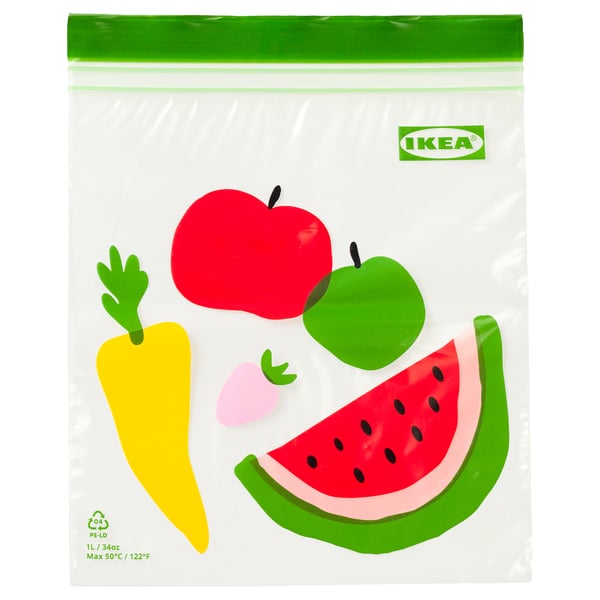 Bossa IKEA ISTAD , de disseny de fruites i verdures de colors, transparent, rectangular, fabricada en plàstic de polietilè.