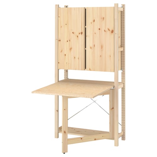 Moble d'emmagatzematge de fusta IVAR, acabat natural clar, forma rectangular, prestatgeries horitzontals, disseny senzill i modern.
