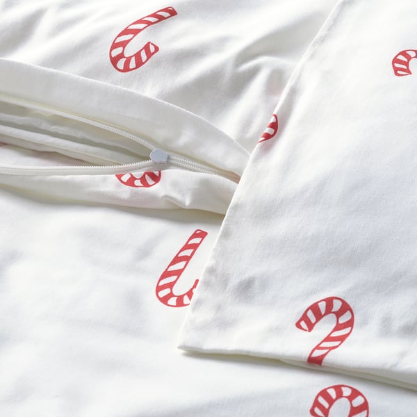 Funda nòrdica blanca amb estampats de canya de caramel vermella, amb tancament de cremallera. Ideal per a la decoració de vacances, confeccionat en cotó suau.