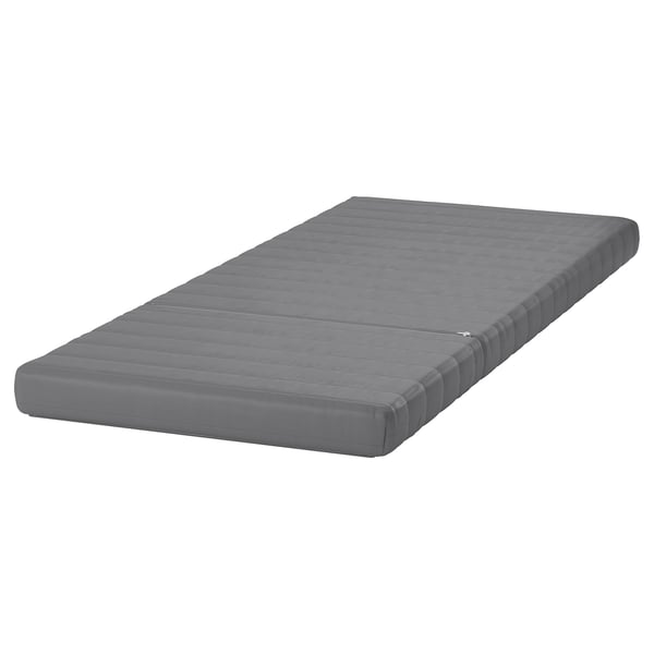 Matalàs d'escuma de lycksele gris, rectangular, disseny encoixinat.