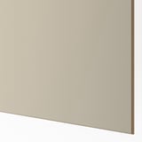 Primer pla del panell beix llis de doble cara, que mostra la textura i l'acabat d'alta qualitat.