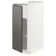 Un moble de cuina METOD blanc amb porta gris fosc i prestatges regulables. Disseny modern, aspecte bicolor.