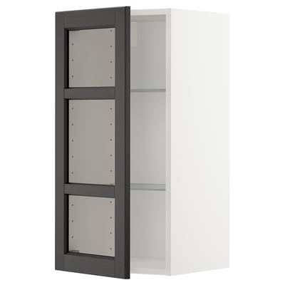 Armari blanc modern amb porta de freixe tenyit de fosc, prestatge de vidre ajustable.