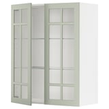 Armari de cuina Ikea METOD amb portes de vidre verd i prestatgeries regulables.