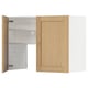 Armari de cuina modern, fusta clara amb interior blanc.