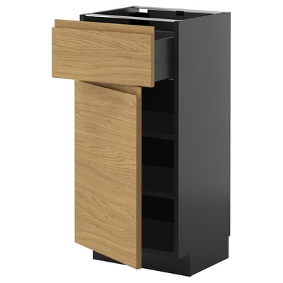 Moble de cuina modern: METOD. Negre i fusta. Calaix obert. Prim, rectangular, minimalista.