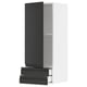 Moble de cuina modern en blanc i negre. Calaix i prestatge obert. Disseny prim i elegant.