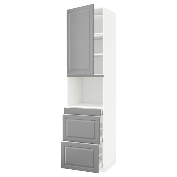 Un armari alt de color blanc amb accents grisos, amb calaixos i prestatges. Part del sistema de cuina METOD.