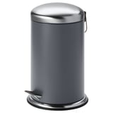Una paperera de pedal MJÖSA grisa amb una elegant tapa d'acer inoxidable, amb un pedal per a ús mans lliures i un mànec per facilitar el moviment.