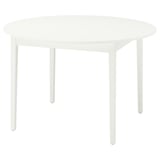 Taula de menjador rodona blanca Ikea NÄSINGE amb tapa llisa i potes de fusta.