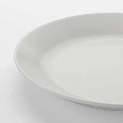 Elegant plat blanc OFTAST, rodó, vores llises, fabricat en vidre temperat.