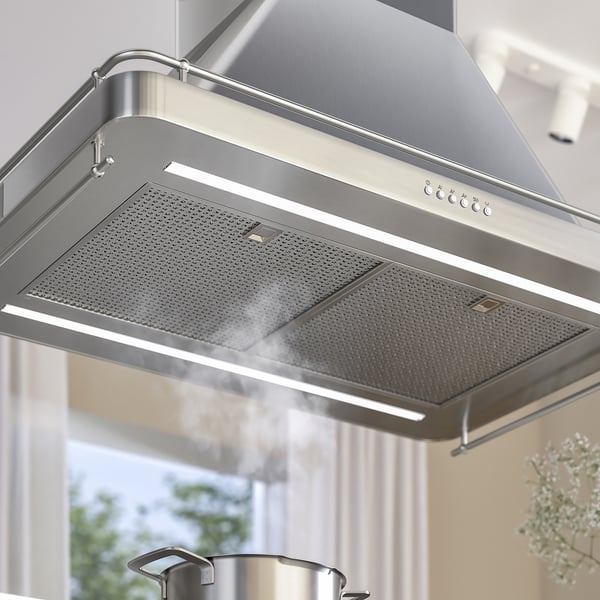 Campana moderna d'acer inoxidable amb disseny elegant i il·luminació led integrada.